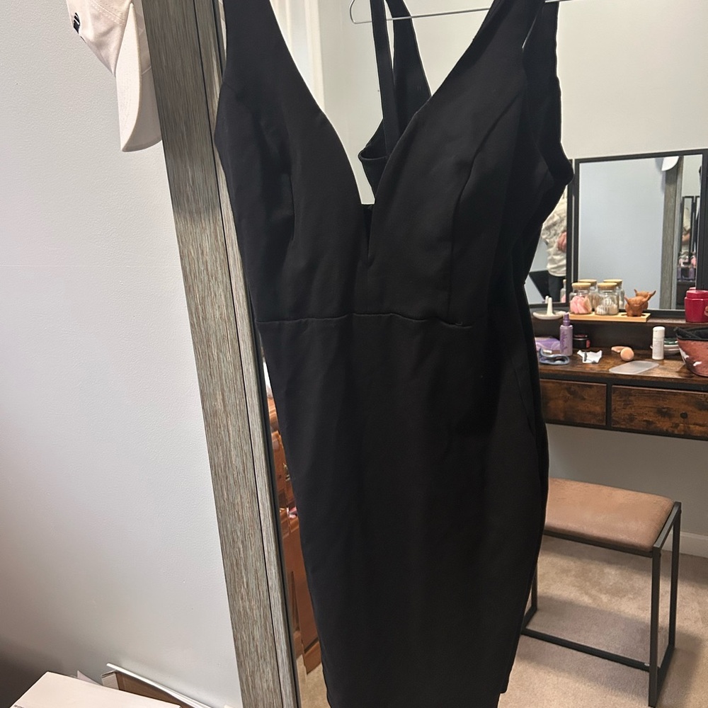 Elegant deep plunge Black Dress